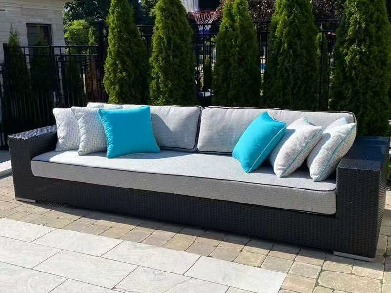 Poolside lounge seating with custom pillows